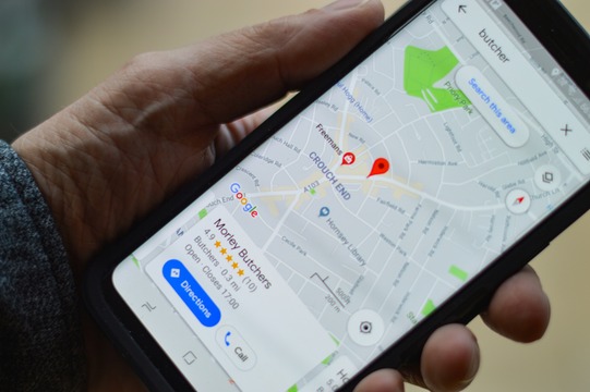mobile phone showing google maps on the screen